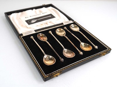 Lot 403 - A set of six silver acanthas knop teaspoons in...