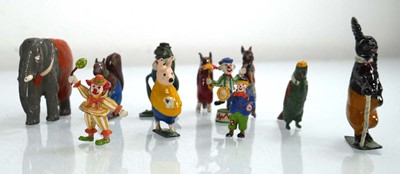 Lot 255 - A group of painted cast metal figures...