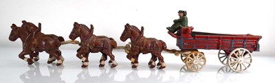Lot 258 - A cast metal six horse team pulling a barrel...