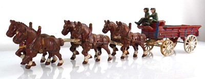 Lot 258 - A cast metal six horse team pulling a barrel...
