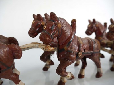 Lot 258 - A cast metal six horse team pulling a barrel...