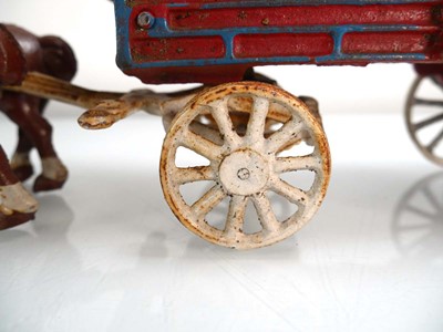Lot 258 - A cast metal six horse team pulling a barrel...