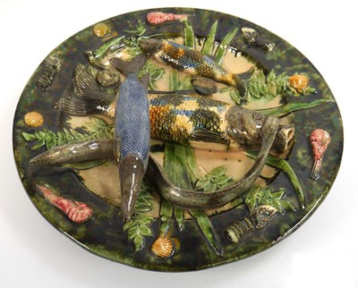 Lot 283 - A Portuguese pottery Palissy style dish,...