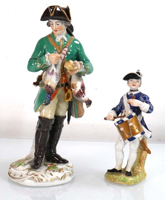 Lot 284 - A Meissen type figure modelled as a game...