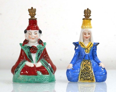 Lot 285 - Two Sitzendorf perfume bottles modelled as an...