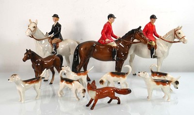 Lot 296 - A Beswick hunting group comprising three...