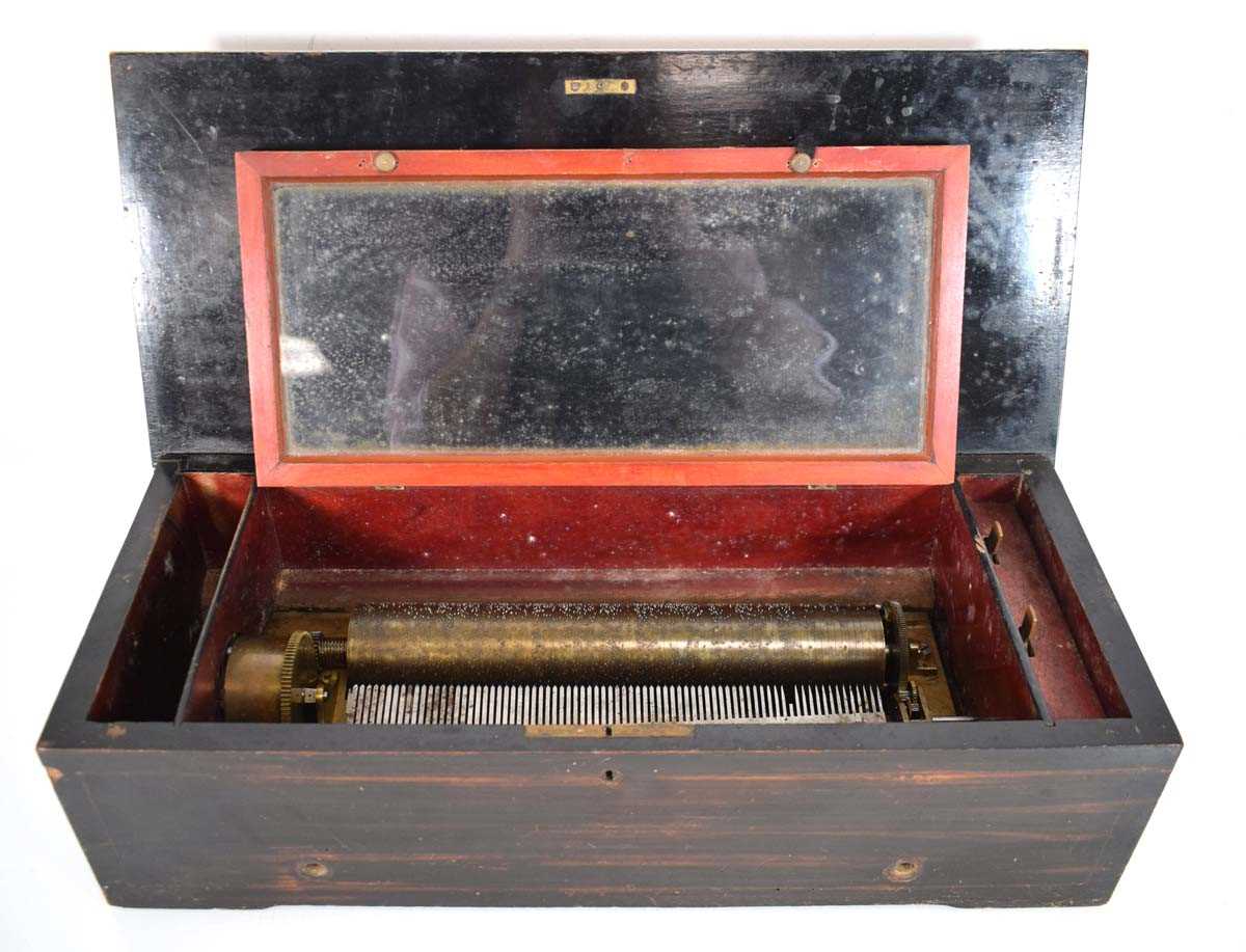 Lot 85 - A 19th century cylinder music box in a walnut,...