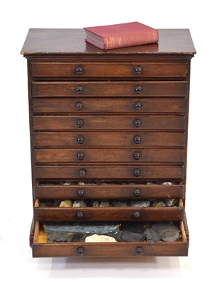 Lot 9 - An early 20th century stained pine ten-drawer...
