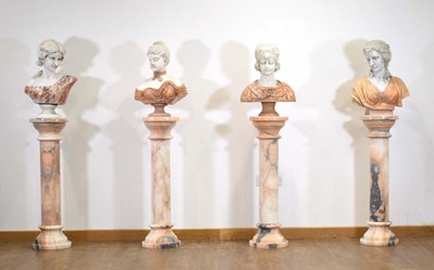 Lot A matched set of four white and rouge marble busts