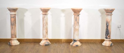 Lot 10 - A matched set of four white and rouge marble busts