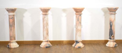Lot 10 - A matched set of four white and rouge marble busts