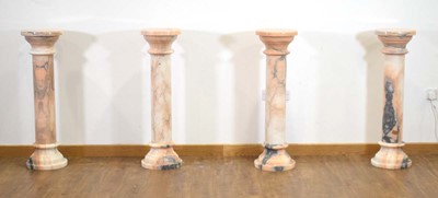 Lot 10 - A matched set of four white and rouge marble busts