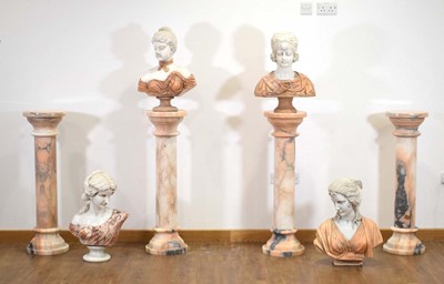 Lot 10 - A matched set of four white and rouge marble busts
