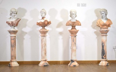 Lot 10 - A matched set of four white and rouge marble busts