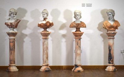 Lot 10 - A matched set of four white and rouge marble busts