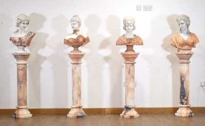 Lot 10 - A matched set of four white and rouge marble busts