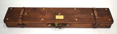 Lot 15 - A leather-covered fishing rod case with brass...