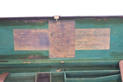 Lot 18 - A leather-covered and brass mounted gun case,...