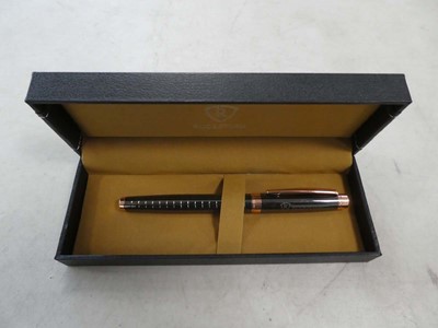 Lot 2146 - Boxed Ruckstuhl rose and black stainless steel...