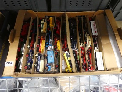 Lot 2186 - 4 boxes containing diecast vehicles