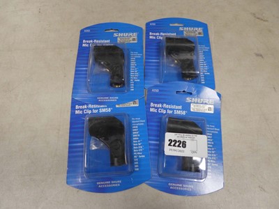Lot 2226 - 4 boxed Shure microphone clips for SM58