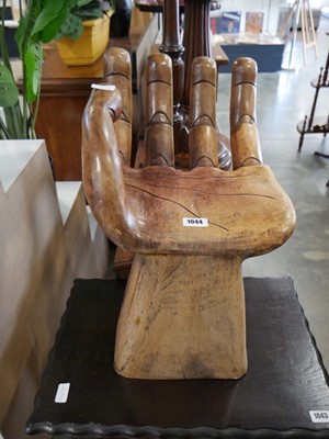 Lot 1044 - Carved stool in the form of a hand