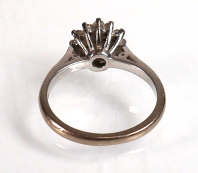 Lot 734 - An 18ct white gold cluster ring set small...