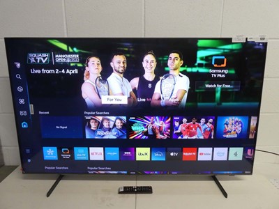 Lot 1357 - Samsung 55" QLED smart TV on stand with remote...