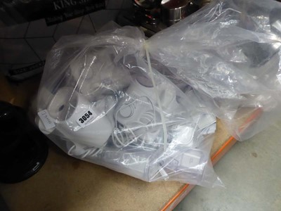Lot 3054 - Bag containing loose Waterpik water flossers