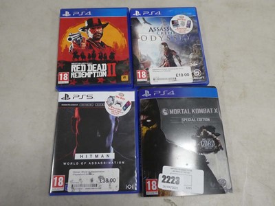 Lot 2223 - Three PlayStation 4 games to include Mortal...