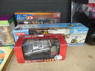 Lot 3298 - Boy racer RC car, RC helicopter and a 3D puzzle