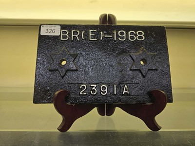 Lot 326 - A black painted cast metal carriage plate...