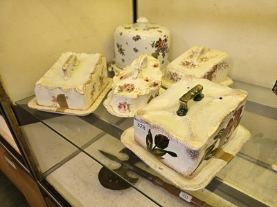 Lot 328 - An assortment of five lidded cheese dishes to...