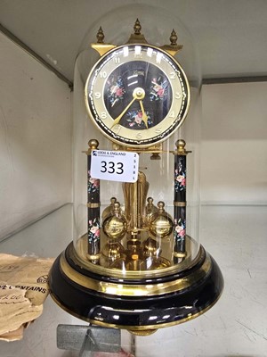 Lot 333 - A domed cased Koma anniversary clock