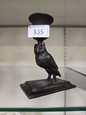 Lot 335 - A possible bronze candlestick with a column in...