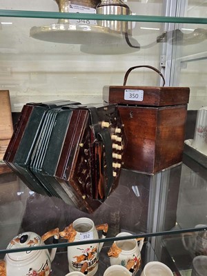 Lot 350 - A cased early 20th century concertina...