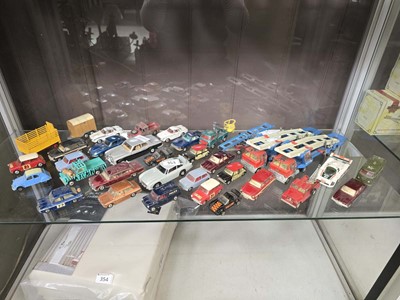 Lot 353 - A large assortment of play worn Corgi play...