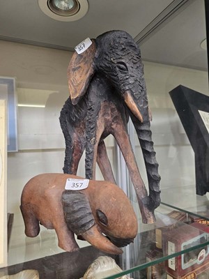 Lot 357 - A mid 20th century style carved wooden figure...