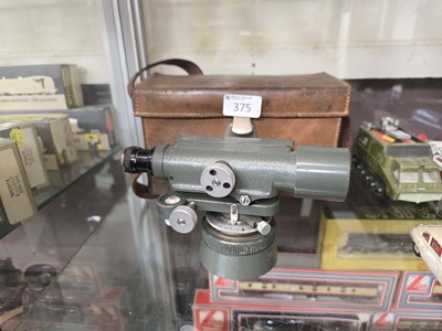 Lot 375 - An early 20th century theodolite in a leather...