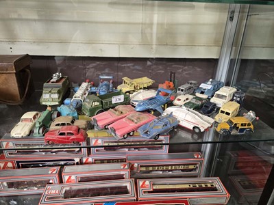 Lot 376 - A selection of play worn Dinky diecast trucks,...