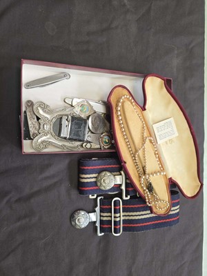 Lot 387 - A carton containing military style belts,...