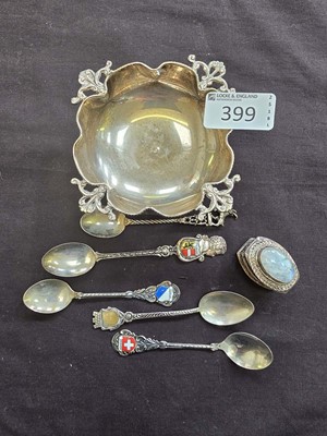 Lot 399 - A white metal dish together with various white...