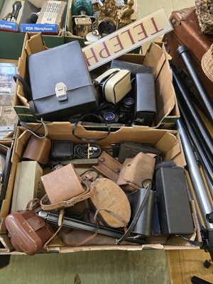Lot 423 - Two trays of photography equipment, binoculars,...