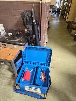 Lot 6 - A selection of fishing rods together with a...