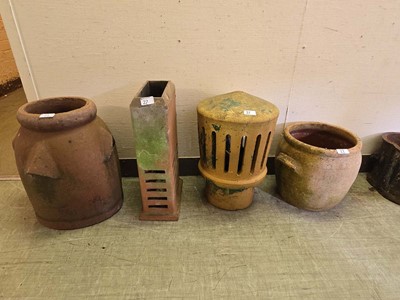 Lot 22 - A selection of four clay pots to include a...