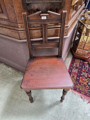 Lot 28 - A late 19th century mahogany hall chair