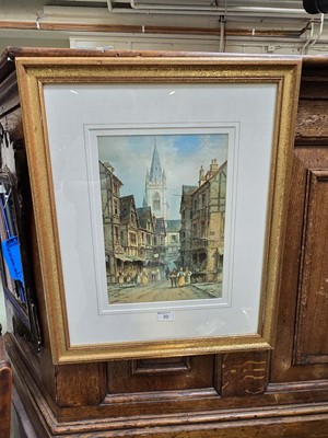 Lot 30 - A framed and glazed watercolour of street...
