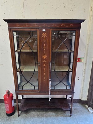 Lot 35 - A Sheraton Revival mahogany glazed cabinet...