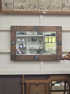 Lot 44 - A copper framed bevel glass wall mirror