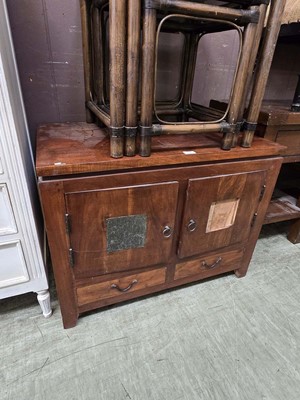 Lot 59 - An eastern hardwood two door cabinet with two...